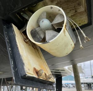 Thruster fairing piece in need of a new bracket.